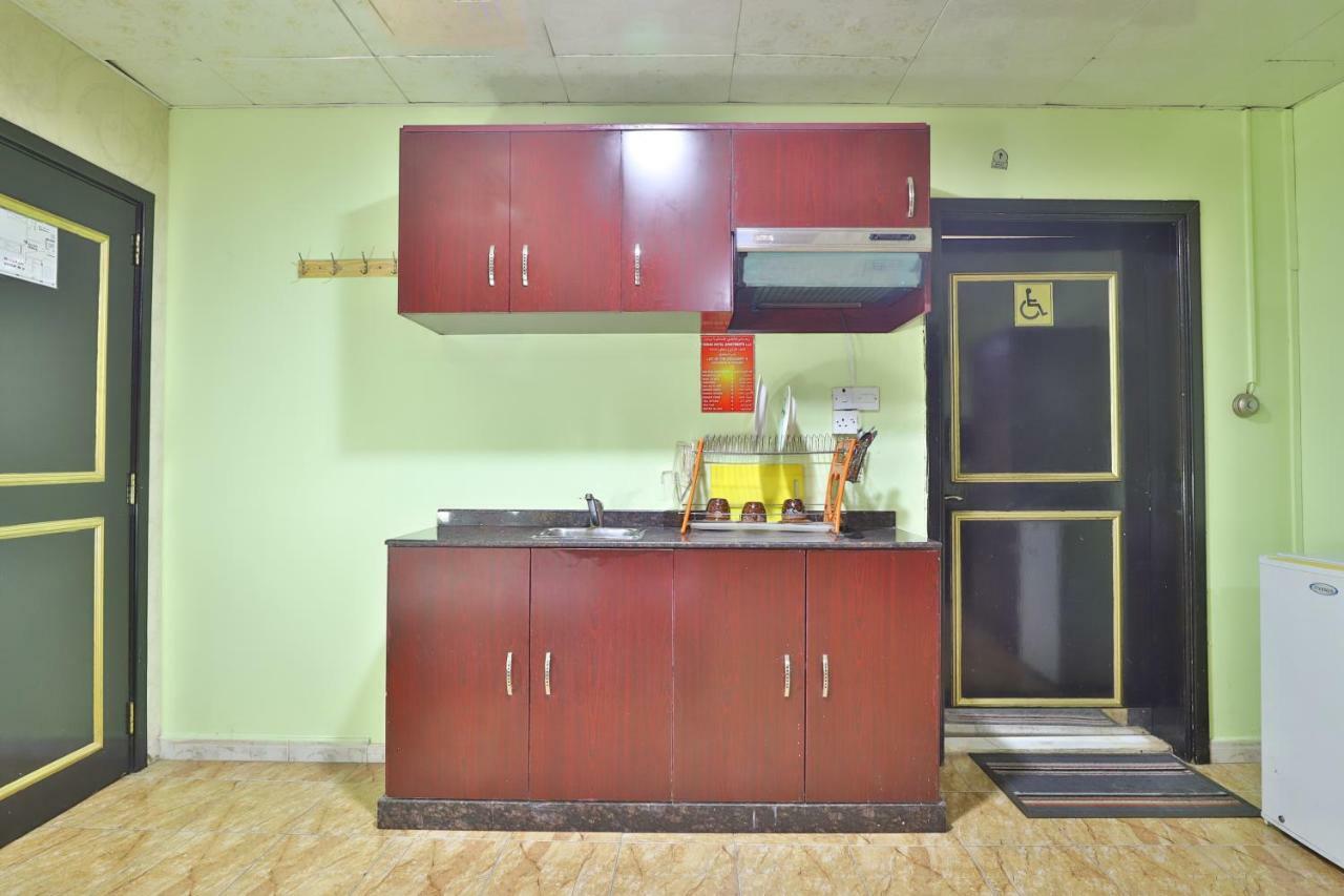 Oyo 261 Remas Hotel Apartment دبي المظهر الخارجي الصورة