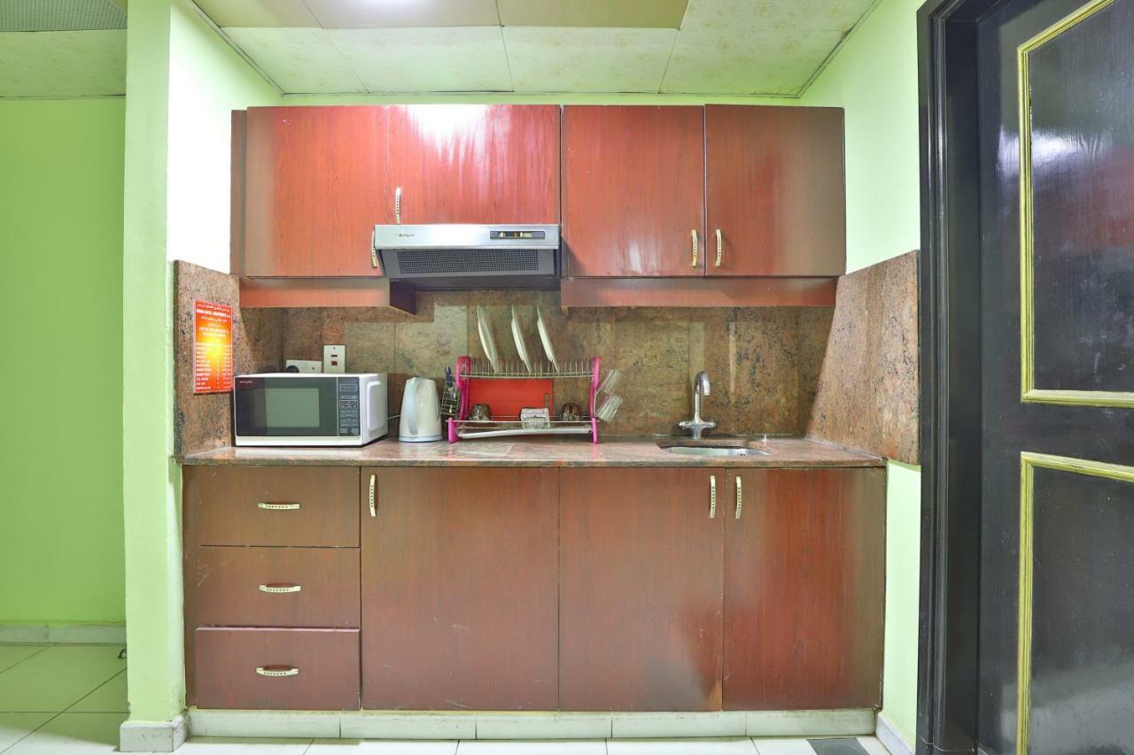 Oyo 261 Remas Hotel Apartment دبي المظهر الخارجي الصورة