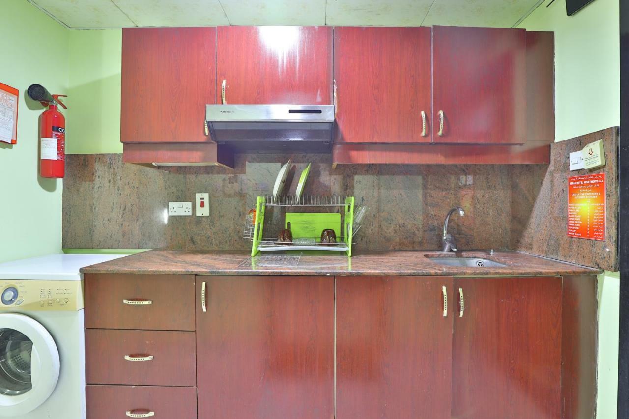 Oyo 261 Remas Hotel Apartment دبي المظهر الخارجي الصورة