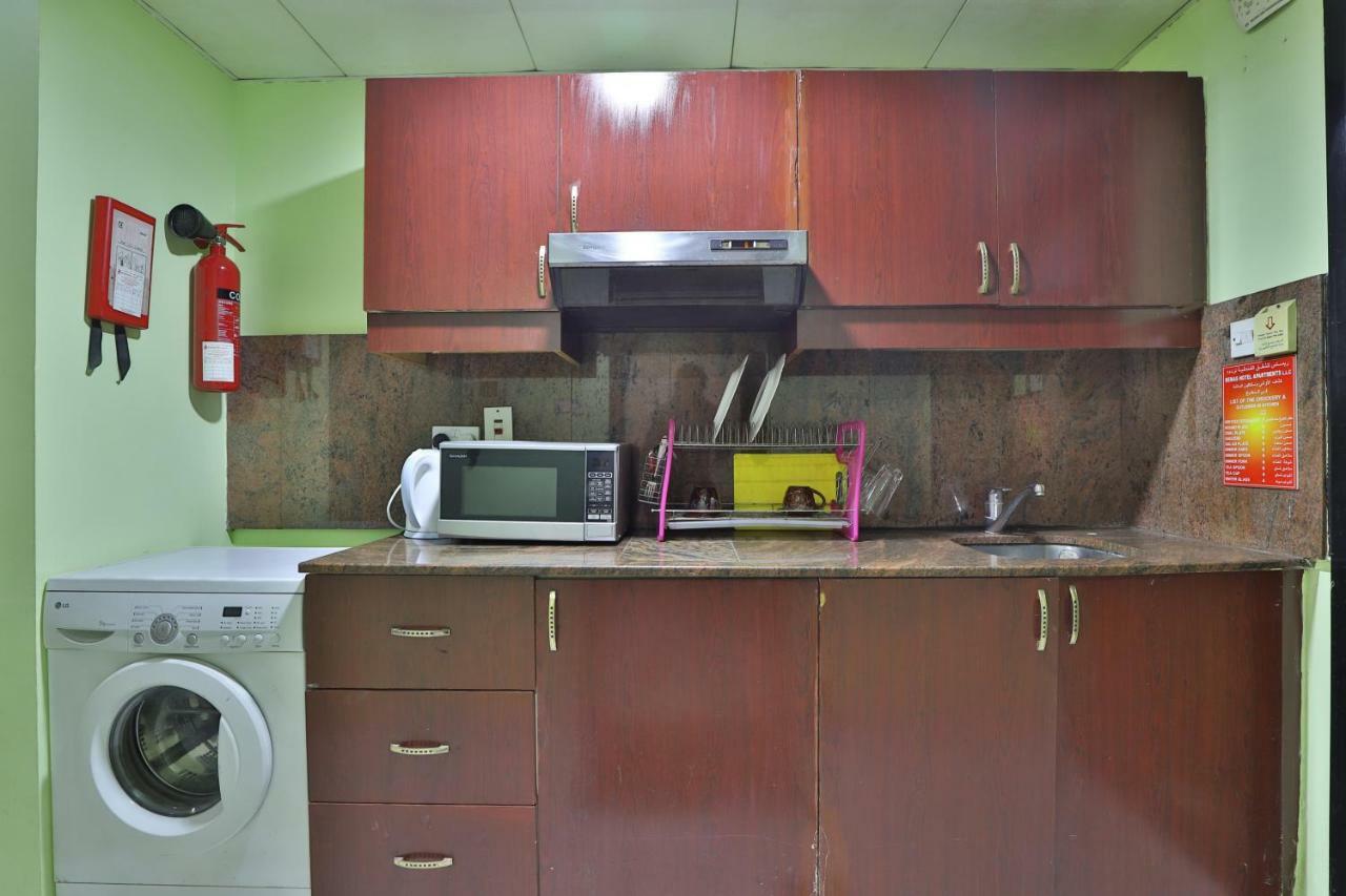 Oyo 261 Remas Hotel Apartment دبي المظهر الخارجي الصورة