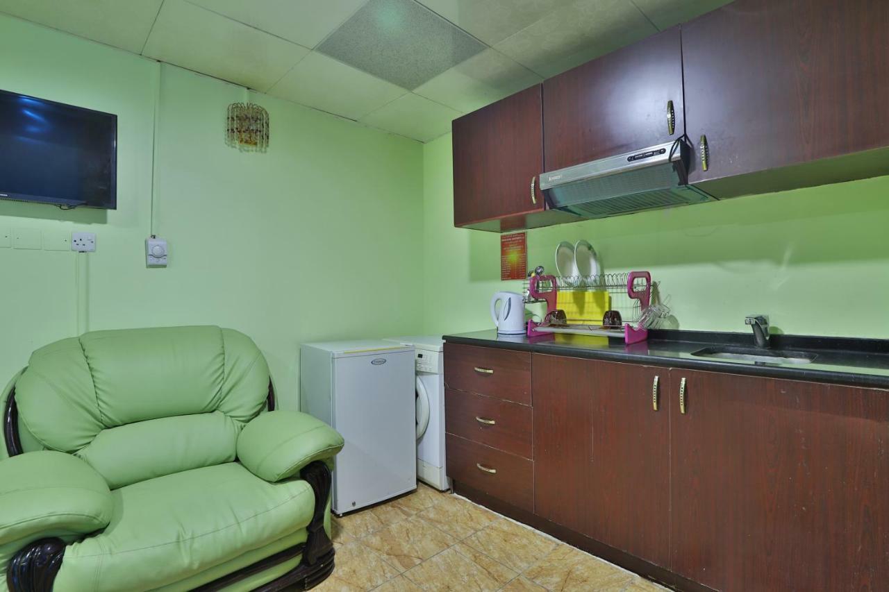 Oyo 261 Remas Hotel Apartment دبي المظهر الخارجي الصورة